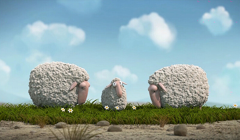 Filmstill Lambs, zwei Elternschafe essen Gras zwischen ihnen steht ein Lamm